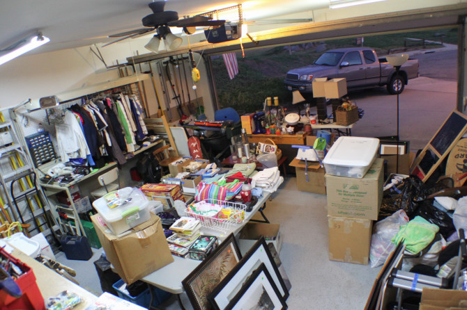 Garage filled with boxes, clothes, and tools - trying to decide how to sell everything you own