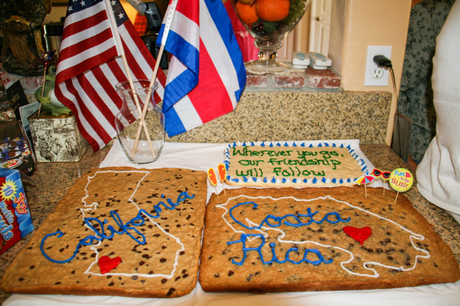 Cookie cakes at going away party with California map and Costa Rica map and flags