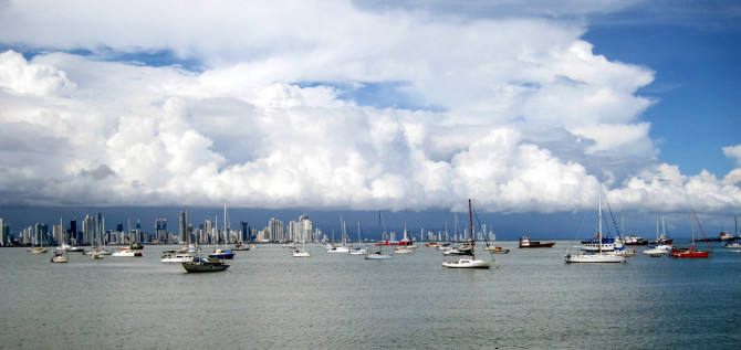 View overlooking the boats anchored next to Panama City with a beautiful blue sky