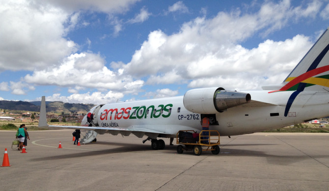 Amaszonas commuter jet in Bolivia with blue sky