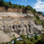 Mountainside Showing Layers Eroded by River