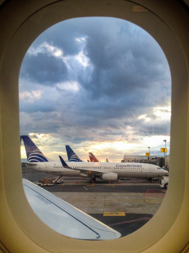 Airplane window, Looking out at other airplanes at SJO airport