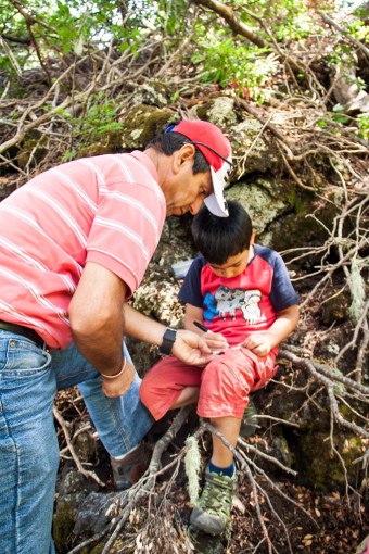 Geocaching with kids treasure hunting in Conguillio national park in Chile