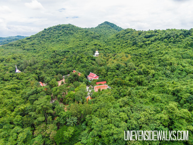 Aerial Photography of Buddhist Temple in Thailand Jungle among the Green Jungle Hills