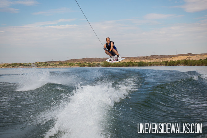 Jumping the Wake on a Wakeboard in the Air