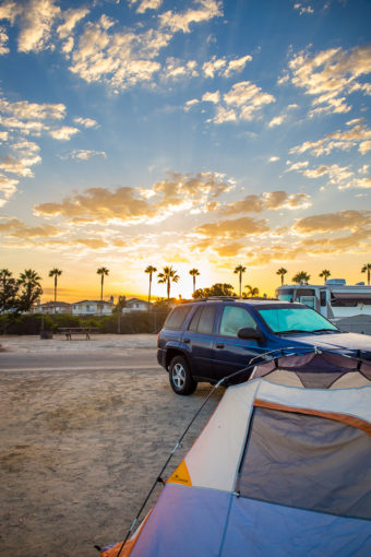 Car Camping tent at sunrise by Carlsbad Beach